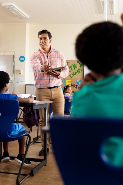 A classroom scene in Brazil, with adult students participating in a literacy program, focusing on hands holding pencils and notebooks. The atmosphere conveys determination and hope for a better future through education.