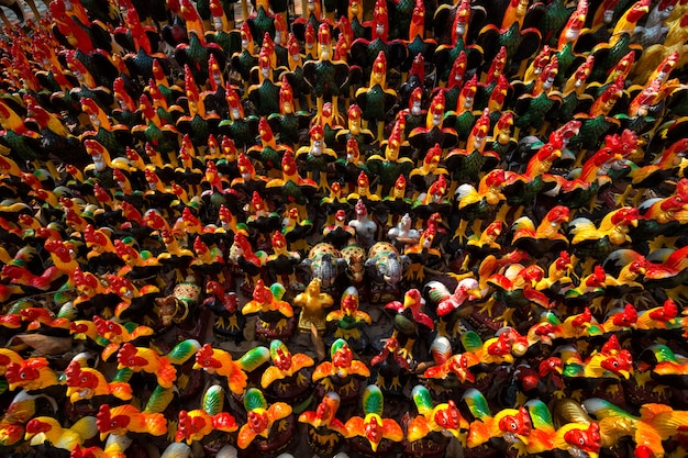 An aerial view of a vibrant street carnival in Salvador, Bahia, with a large group of people dancing to Afro-Brazilian music. The scene captures the energy and cultural richness of the event.