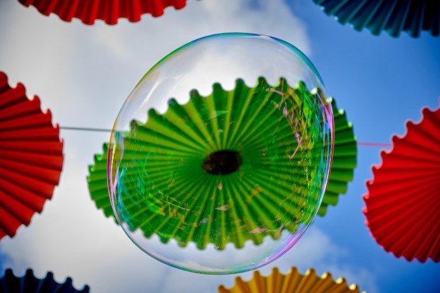 A close-up shot of a sustainable Carnival float made from recycled materials, showcasing the creativity and eco-consciousness of the event.