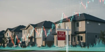 Modern houses with a 'for sale' sign, representing the 2025 housing market outlook.