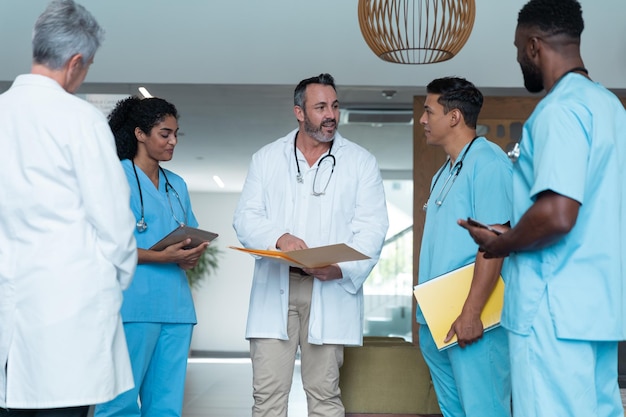 A group of healthcare professionals (doctors, nurses, and community health workers) interacting with patients in a community center. The scene is bright and welcoming, emphasizing the role of community healthcare services.